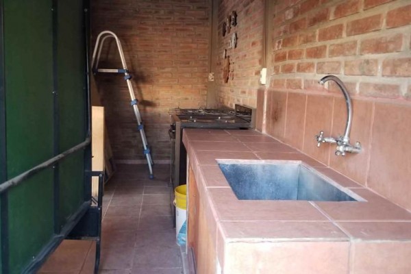 Casa 4 habitaciones dormitorios Villa Carlos Paz cerca del centro y a 100m del rio