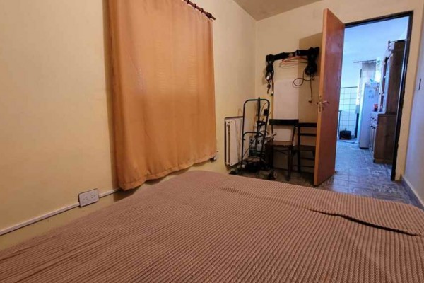 Casa 2 dormitorios amplio parque a 15 cuadras del centro