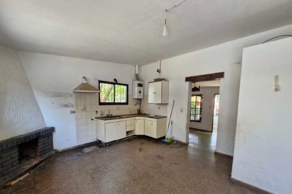 Casa 2 dormitorios con quincho y departamento de 1 dormitorio al fondo barrio Carlos Paz Sierras