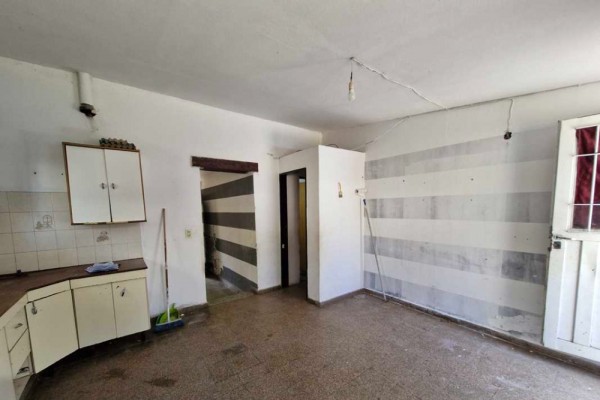 Casa 2 dormitorios con quincho y departamento de 1 dormitorio al fondo barrio Carlos Paz Sierras