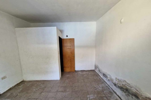 Casa 2 dormitorios con quincho y departamento de 1 dormitorio al fondo barrio Carlos Paz Sierras