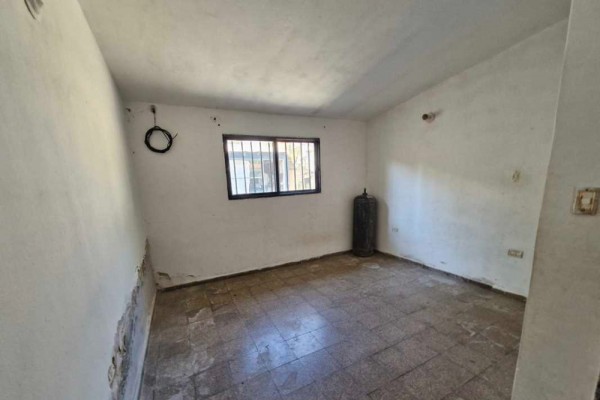Casa 2 dormitorios con quincho y departamento de 1 dormitorio al fondo barrio Carlos Paz Sierras