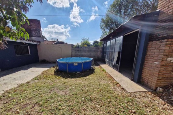 Casa 2 dormitorios con quincho y departamento de 1 dormitorio al fondo barrio Carlos Paz Sierras
