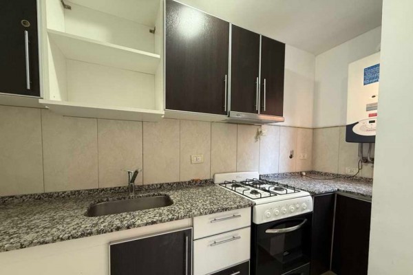 DEPARTAMENTO DE UN DORMITORIO CON COCHERA Y PATIO PROPIO - EDIFICIO TORRE SERENA 