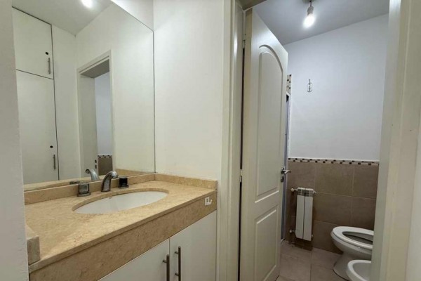 DEPARTAMENTO DE UN DORMITORIO CON COCHERA Y PATIO PROPIO - EDIFICIO TORRE SERENA 