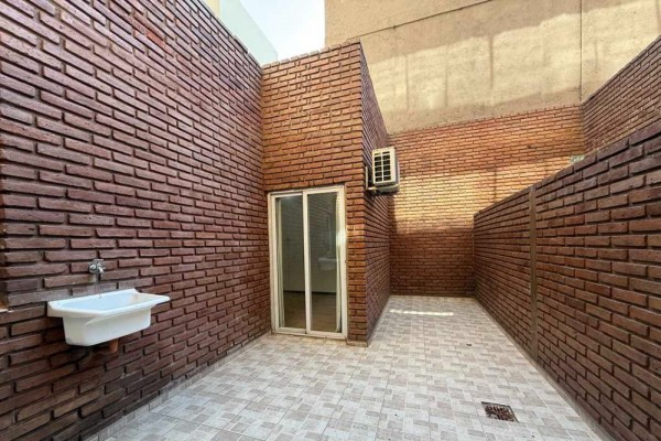 DEPARTAMENTO DE UN DORMITORIO CON COCHERA Y PATIO PROPIO - EDIFICIO TORRE SERENA 