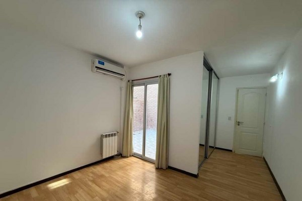DEPARTAMENTO DE UN DORMITORIO CON COCHERA Y PATIO PROPIO - EDIFICIO TORRE SERENA 