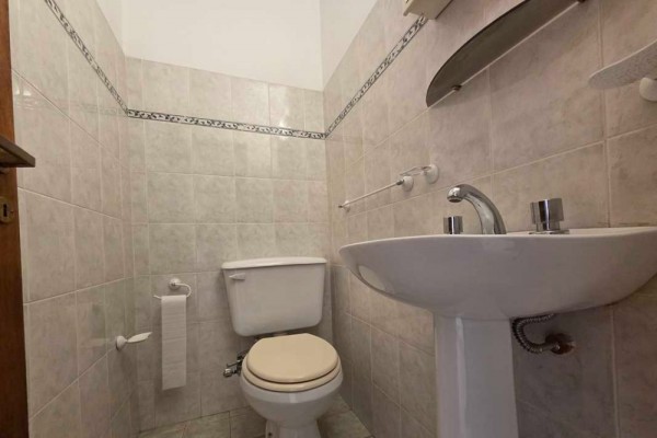 Edificio Del Lago A - 2 dormitorios, 2 baños, cochera, quincho