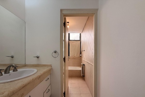 DEPARTAMENTO DOS DORMITORIOS CON COCHERA - EDIFICIO MELOS