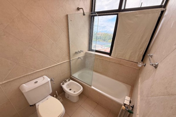 DEPARTAMENTO DOS DORMITORIOS CON COCHERA - EDIFICIO MELOS